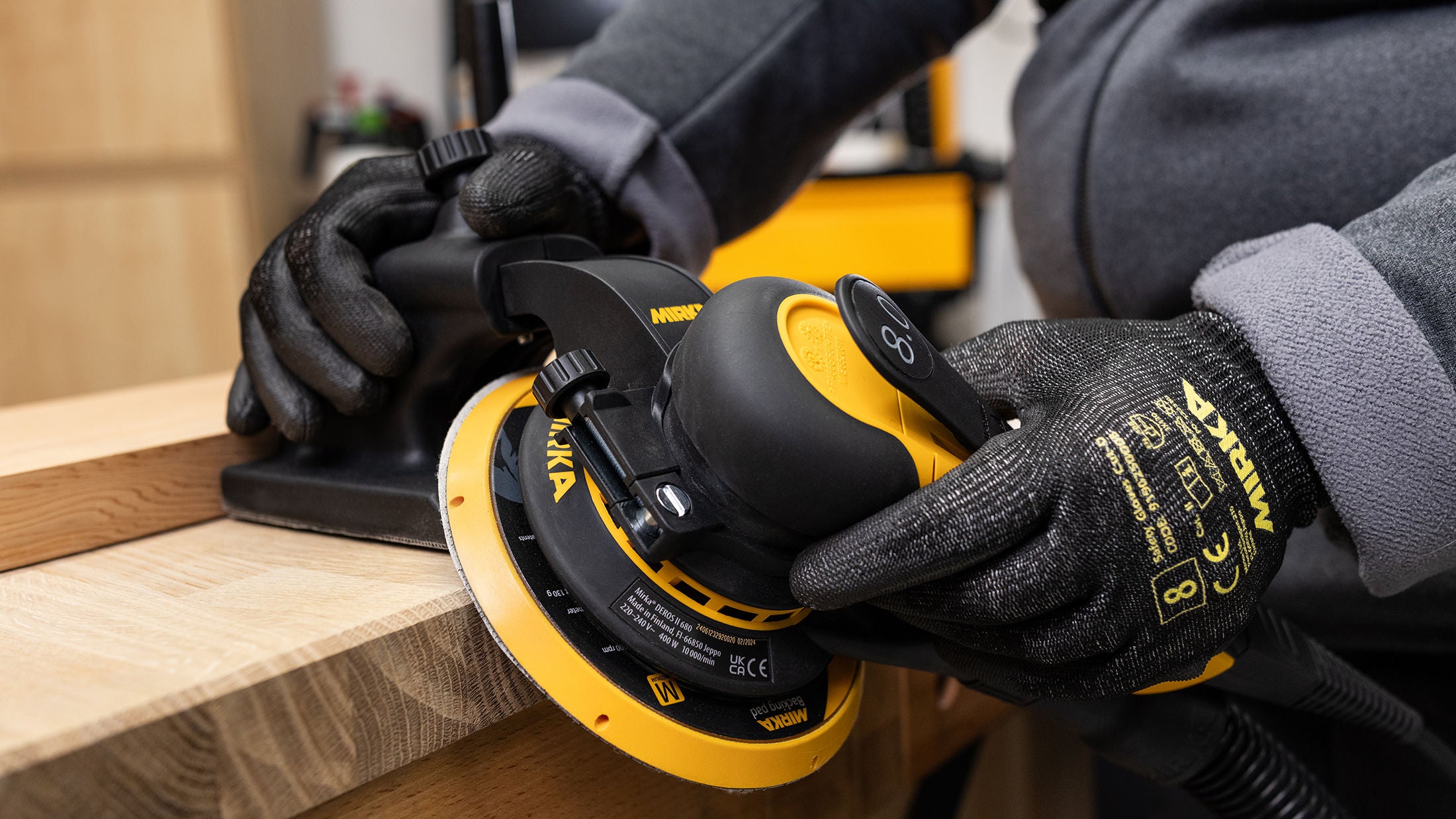 Mirka Edge Guide on DEROS II sanding oak